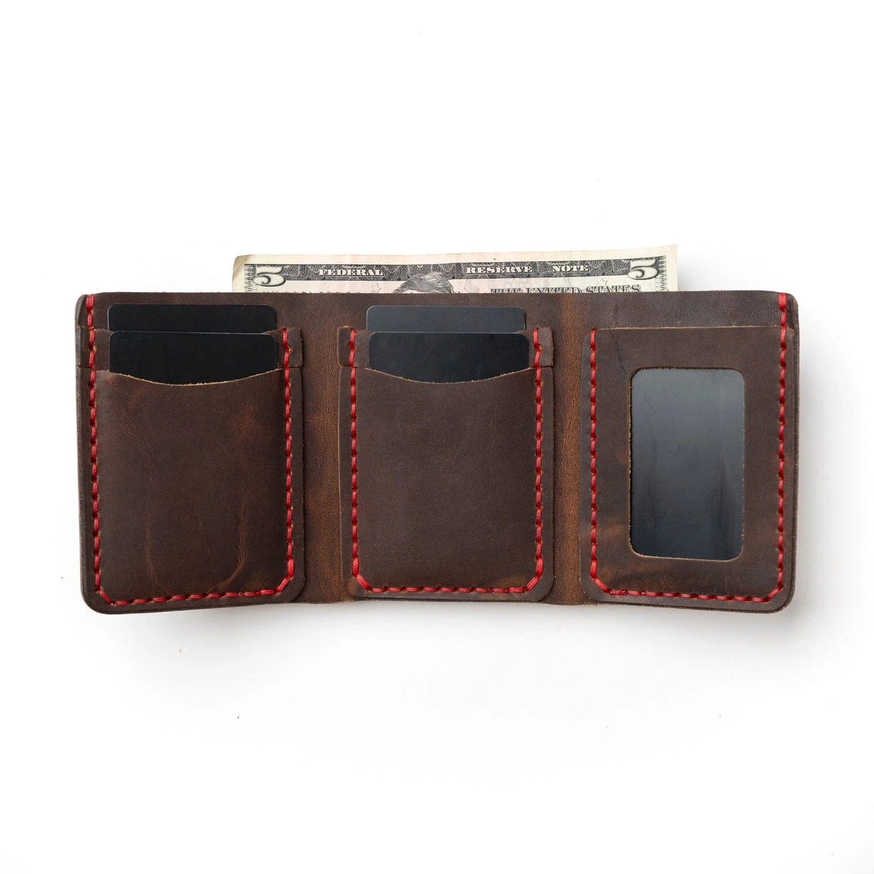 Trifold wallet in Heritage Brown leather with red stitching